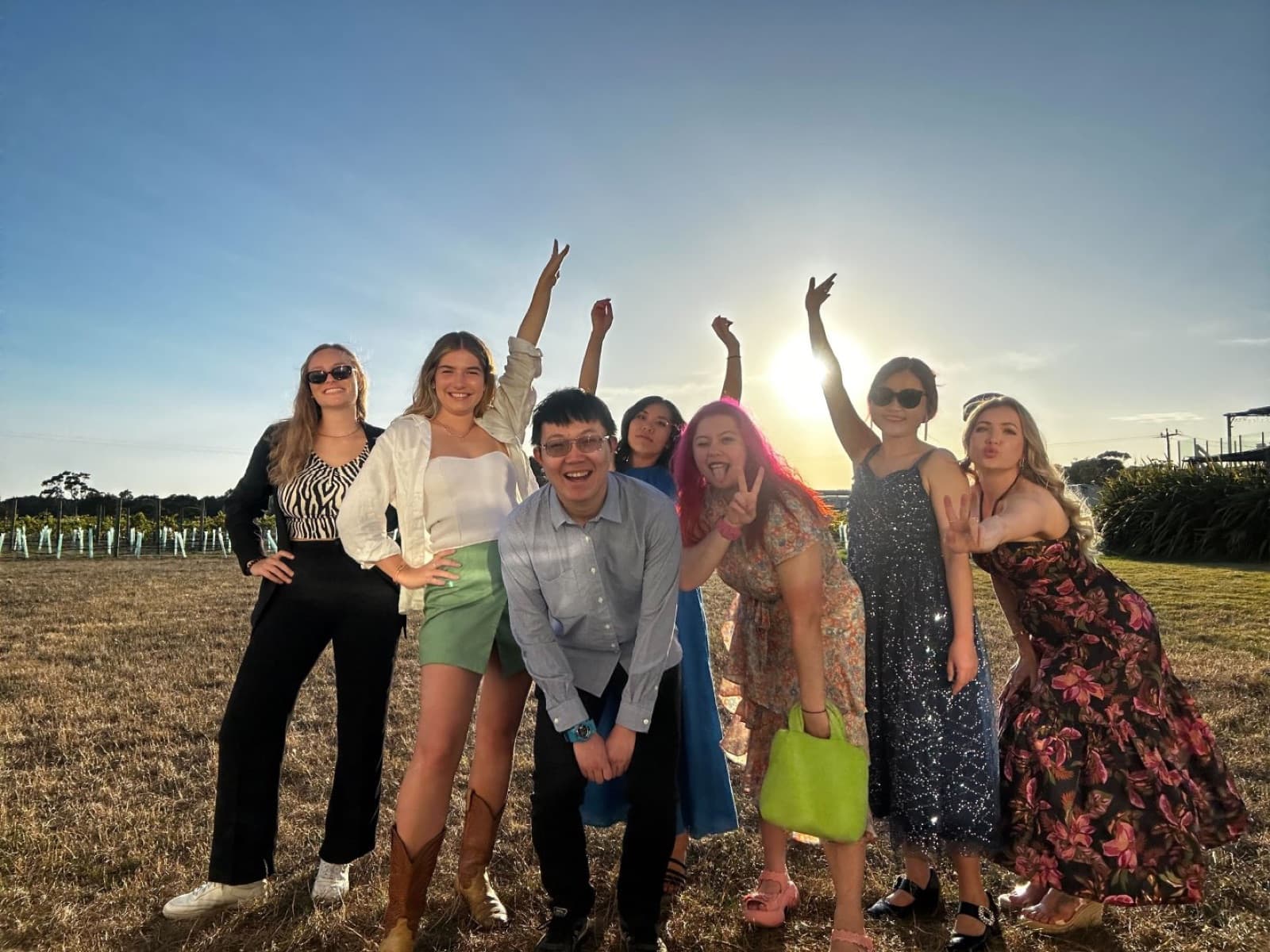 The InvestorHub team celebrating at sunset